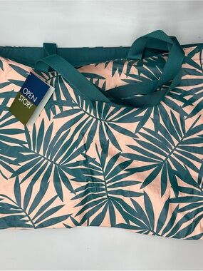 Open Story Teal/Peach Palm Print Reversible, Water Resistant Tote Bag